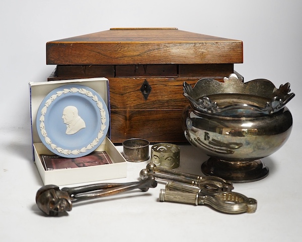 A Regency rosewood tea caddy, three pairs of nut crackers including a novelty skull nut cracker, a plated bowl, two napkin rings and a Wedgwood dish. Condition - varies